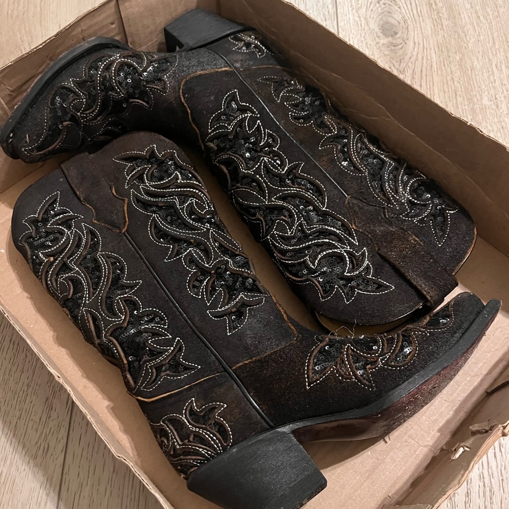 Brown and black snip toe boots